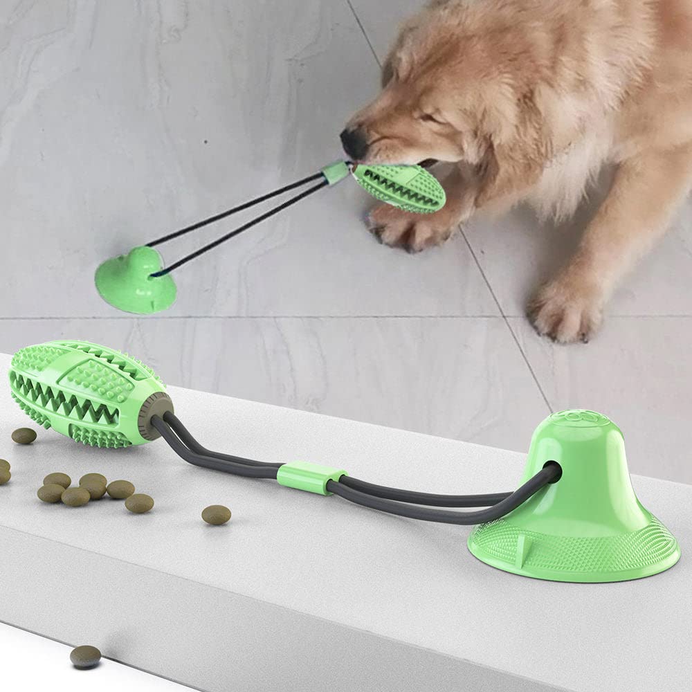 Pet Life  'Grip N' Play' Treat Dispensing Football Shaped Suction Cup Dog Toy