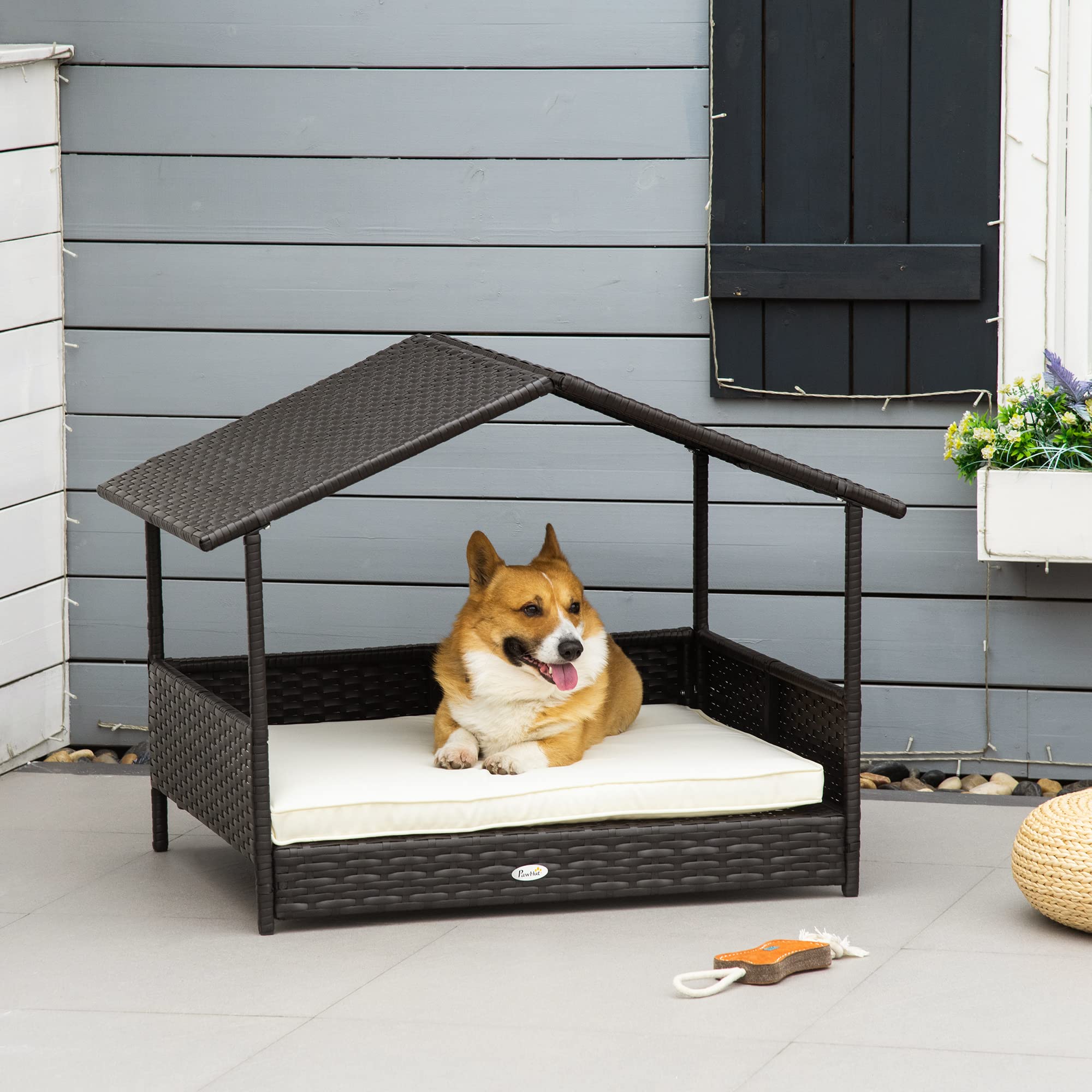 PawHut Wicker Dog House Outdoor with Canopy, Rattan Dog Bed with Water-Resistant Cushion, for Small and Medium Dogs, Cream
