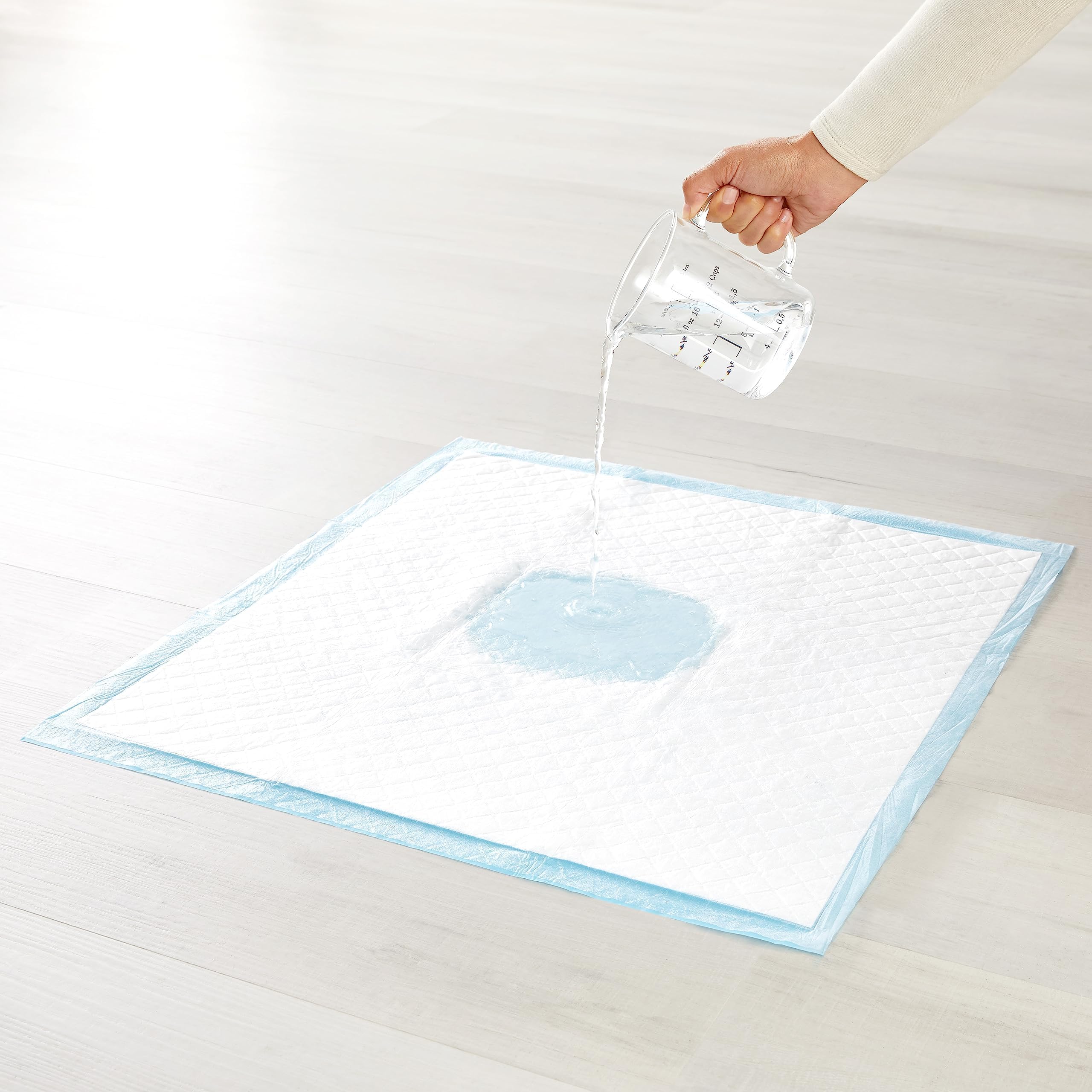 Amazon Basics Heavy Duty, Absorbent Dog and Puppy Pee Pads with 5-Layer Leak-Proof Design and Quick-Dry Surface for Potty Traini
